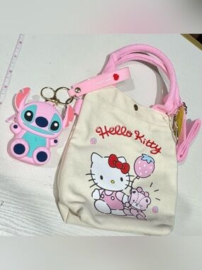 Hello Kitty Ivory Canvas Kids Tote with Pink Handles and Red Bow Print